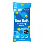 Matte single packs and a tidy column of twelve Brave Roasted Peas Sea Salt 35g sit on a neutral surface. Bold navy logo and crisp white typography contrast with green pea illustrations. A small transparent window reveals golden roasted peas and coarse salt crystals inside. Crisp matte finish borders