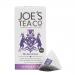 A neatly stacked six-pack of compact rectangular tea boxes with muted blue-gray packaging. Each box shows the Joe's Tea Co. name, 'Earl of Grey' label, a stylized teacup and bergamot illustration, an organic seal, and crisp white typography against a clean background In soft light with shallow focus