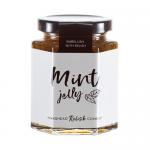 Six small glass jars of Hawkshead Relish mint jelly sit in neat rows. Clear jars reveal translucent pale green jelly; each jar has a white lid and a cream label with Hawkshead Relish branding. Soft lighting casts gentle reflections on the glass.