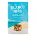 Photo shows eight identical 170g bags of Blanco Niño Lightly Salted Tortilla Chips arranged in two neat rows. Each glossy pack faces forward, displaying the brand name and an image of golden triangular tortilla chips with visible salt crystals; a few chips lie scattered in front.