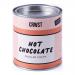 Photo shows six 210g CRWST Hot Chocolate canisters in warm brown and cream packaging. Each features the CRWST logo, an illustrated steaming mug and product name. Cans stand side-by-side on a grocery shelf, with clear labels, consistent color blocking and glossy finishes. Soft highlights, warm tones.