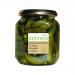 Six clear glass jars sit in a row, each filled with bright green cornichons suspended in pale golden vinegar. Metal lids glint under studio light; simple white labels bearing a Drivers logo and neat text wrap each jar, with tiny bubbles and seeds visible in the brine.