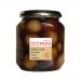Glass jar of Drivers shallots in cider vinegar sits upright, revealing small pearl shallots submerged in pale amber liquid. A simple paper label with brand name and product details wraps the jar. Light catches the glass, highlighting texture and suspended spices. Metal lid shows soft reflections up.
