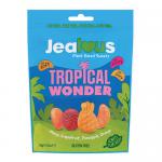 A row of ten glossy share bags shows vibrant tropical artwork: sliced pineapple, mango and passionfruit splashes against a teal and sunset gradient. Bold handwritten logo sits centrally while clear windows reveal colorful fruit-shaped sweets inside each 125g pouch. Metallic highlights catch the light.