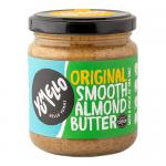 Six glass jars of Yumello Smooth Almond Butter sit in a neat row, each with a round white lid and a bright yellow label showing the brand name and almond illustration. The creamy light-brown spread is visible through the glass, and soft studio lighting highlights glossy surfaces. Soft glossy sheens.