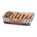 A rustic bakery pack sits open to reveal a neat stack of round, golden shortbread biscuits flecked with dark chocolate pieces. Crumbs scatter on a wooden board beside a linen cloth; the box shows a simple farmhouse label in muted tones, evoking a homely artisanal look. Soft golden edges, sugar glint