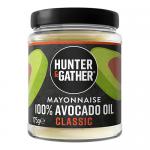 Image shows six Hunter & Gather Avocado Oil Mayonnaise 175g jars with green-accented labels grouped beside assorted Hunter & Gather chutney and condiment jars. White lids and clear containers reveal creamy pale mayo and rich-hued chutneys on a neutral surface.