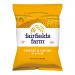 A stacked display shows ten Fairfields Farm Cheese & Onion crisps packets in glossy green packaging. Bold yellow logo sits above an illustrated wheat motif and sliced cheese and onion images. Individual 150g bags reflect studio lighting and cast soft shadows on a white background. Satin sheen across