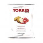 A glossy bag of Torres Iberian Ham crisps sits upright against a plain background. The packaging shows deep red fading to cream, a photo of thin wavy crisps beside sliced Iberian ham, gold lettering and a small green emblem, with crisp nutritional text along the bottom. A subtle sheen on the wrapper