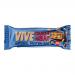 Photo shows a 12-pack box of Vive Natural Crunchy Hazelnut protein bars. Earthy brown and cream wrappers display the green Vive logo, hazelnut illustrations and a cross-section of a bar revealing a dense, nutty, crunchy interior. All items sit on a plain white background.
