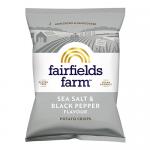 Fairfields Farm Salt & Black Pepper crisps pack sits on a plain surface, the 40g label and branded logo prominent. The bag shows salt crystals and whole black peppercorn imagery; several golden potato crisps spill from a torn top beside scattered seasoning.