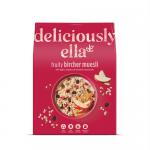 Six beige boxes of Deliciously Ella Bircher Muesli sit on a white surface. Each box features a pastel label with the brand name in a handwritten-style font, a simple bowl illustration showing oats, seeds and fruit accents, and clear product lettering.