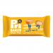 A colorful box shows twelve individually wrapped oaty pies labeled 'Pri Bakes Oaty Pies Cashew Butter 48g.' Each wrapper displays a round oat cake split to reveal creamy cashew butter, scattered oats and whole cashews, with the brand logo and nutritional icons on a warm beige-green background. Close.
