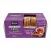 A rectangular pack of twelve 100g Olina's Bakehouse Seeded Toasts in Fig and Almond flavor sits upright. A clear window reveals thin golden-brown crisp toasts studded with sesame and flax seeds, visible fig pieces and slivered almonds; a simple label shows brand and flavor.
