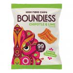An upright matte pouch of Boundless Chipotle & Lime Activated Chips centers the image, displaying a bold logo, chipotle flame graphic and lime slice illustration. Several irregular, lightly dusted crisps spill beside the bag onto a pale wooden surface under soft studio lighting.