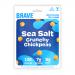 A rectangular retail box holds twelve slim 35g packets of Brave Roasted Chickpeas Sea Salt. Bright, modern packaging features the bold BRAVE logo, a close-up of roasted chickpeas with sea salt crystals, and blue-and-gold color accents alongside small icons and text.