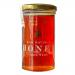 Six clear glass jars of Maters & Co Raw Orange Blossom Honey sit in two neat rows on a pale surface. Amber honey gleams through the glass; each jar has a white screw-top lid and a bright label showing the Maters & Co name and orange-blossom artwork.