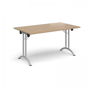Rectangular folding leg table with silver legs and curved foot rails