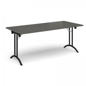 Rectangular folding leg table with black legs and curved foot rails