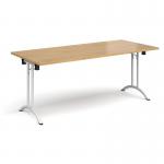 Rectangular folding leg table with white legs and curved foot rails 1800mm x 800mm - oak