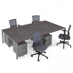 Connex II starter kit for 4 people, comprising of grey oak desk, silver frame, silver metal pedestal and Travis mesh chairs in black CSTR-S-GO