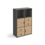 The photo showcases a sleek and modern grey storage unit with oak inserts, standing at 1295mm tall and equipped with 2 cupboards and 2 sets of drawers. The unit also features glides for easy mobility. Perfect for organizing and storing various items in any room.
