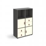 This picture shows a grey cube storage unit with two cupboards and two sets of drawers. It stands at 1295mm high and has glides for easy movement. There are white inserts on the doors and drawers, adding a touch of contrast.