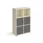 This photo captures a sleek and modern cube storage unit, 1295mm high, on glides with 2 cupboards and 2 sets of drawers. The white exterior is accented by subtle grey inserts, adding a touch of sophistication to this universal storage solution.