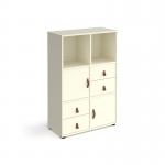 The photograph shows a white universal cube storage unit with a height of 1295mm, equipped with 2 cupboards and 2 sets of drawers on glides. It has white inserts and is part of the Dams Cube Units collection.