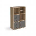 The Dams Cube Units Universal cube storage unit is 1295mm high and is mounted on glides for easy movement. It is made of oak with grey inserts and has a matching shelf, cupboard and 2 sets of drawers. This versatile unit is perfect for organizing any space and adds a touch of elegance to any room.