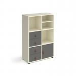 This picture showcases a versatile cube storage unit that stands 1295mm high and comes with glides for easy mobility. It includes a matching shelf, cupboard, and 2 sets of drawers, all in a sleek white design with grey inserts. Perfect for organizing any space with style.