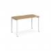The picture shows a sleek and modern Dams Bench Desking Adapt single desk. It has a white frame and a beautifully crafted oak top. The desk measures 1200mm x 600mm.