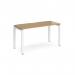This photo features a sleek and modern Dams Bench Desking Adapt single desk with a white frame and oak top. The desk measures 1400mm x 600mm and offers a clean and minimalist workspace. The white frame adds a contemporary touch, while the oak top adds warmth and character.