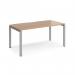 This photograph shows a sleek and modern single desk from our Dams Bench Desking collection. The desk measures 1600mm x 800mm and features a silver frame with a beech top. Its clean lines and contemporary design make it a stylish addition to any office space.
