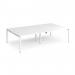 The photograph captures a row of sleek, modern white desks with a sturdy white frame. The double back to back arrangement creates a collaborative workspace, while the 2800mm x 1600mm size offers plenty of room for productivity. Overall, a clean and functional design for any office.