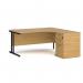 The image shows a sleek and modern Dams Right Hand Desks Maestro 25 desk with a 1600mm width. It features a black cantilever frame and a desk high pedestal, both in oak. The desk is designed ergonomically to promote comfortable and healthy working habits.