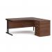The photo shows a sleek and modern Dams Maestro 25 right hand ergonomic desk, boasting a 1600mm size and black cantilever frame. It also includes a desk high pedestal in walnut finish, adding style and functionality to any office space.