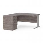 Maestro 25 left hand ergonomic desk 1400mm with silver cantilever frame and desk high pedestal - grey oak