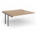 The picture shows a spacious boardroom table with a sleek silver frame and a beech top. An add on unit measuring 1600mm x 1600mm completes the table, providing ample space for conferences and meetings.