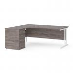 Maestro 25 left hand ergonomic desk 1800mm with white cantilever frame and desk high pedestal - grey oak