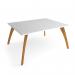 This photo shows a large worktable with a deep, 1600mm x 1600mm surface made of solid oak. The table has four sturdy white legs and is perfect for any workspace or crafting area.