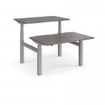 Elev8 Touch sit-stand back-to-back desks 1200mm x 1650mm - silver frame and grey oak top