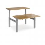 Elev8 Touch sit-stand back-to-back desks 1200mm x 1650mm - silver frame, oak top EVTB-1200-S-O