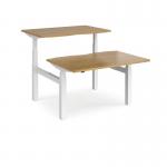 Elev8 Touch sit-stand back-to-back desks 1200mm x 1650mm - white frame, oak top EVTB-1200-WH-O