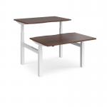 Elev8 Touch sit-stand back-to-back desks 1200mm x 1650mm - white frame, walnut top EVTB-1200-WH-W