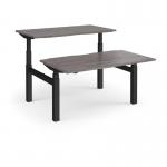 Elev8 Touch sit-stand back-to-back desks 1400mm x 1650mm - black frame and grey oak top