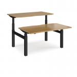 Elev8 Touch sit-stand back-to-back desks 1400mm x 1650mm - black frame and oak top