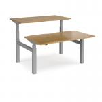 Elev8 Touch sit-stand back-to-back desks 1400mm x 1650mm - silver frame and oak top