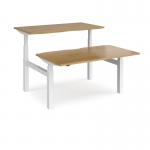 Elev8 Touch sit-stand back-to-back desks 1400mm x 1650mm - white frame, oak top EVTB-1400-WH-O