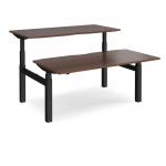 Elev8 Touch sit-stand back-to-back desks 1600mm x 1650mm - black frame and walnut top